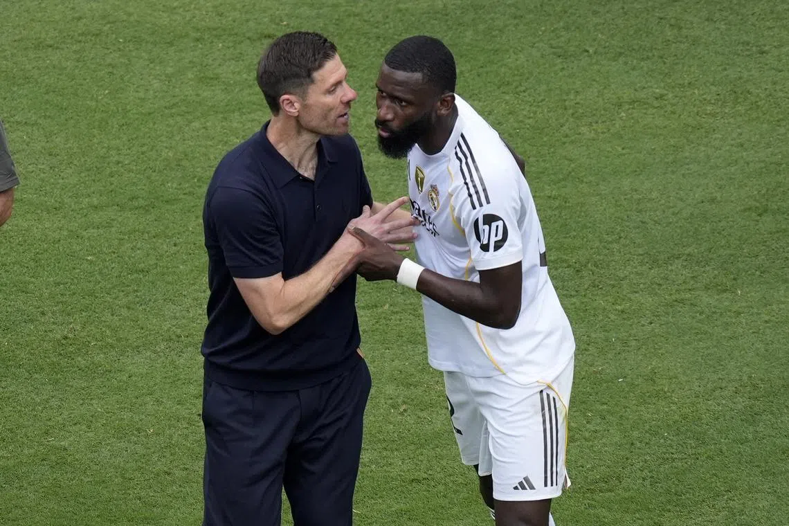 Real Madrid coach Xabi Alonso and defender Antonio Ruediger after their Club World Cup Group H win over Mexican side Pachuca on June 22.
