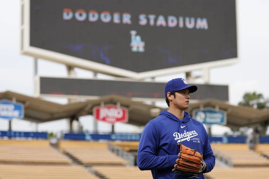 Los Angeles Dodgers' Shohei Ohtani waming up during batting practice prior to the start of the exhibition game between the Los Angeles Dodgers and the Los Angeles Angels.