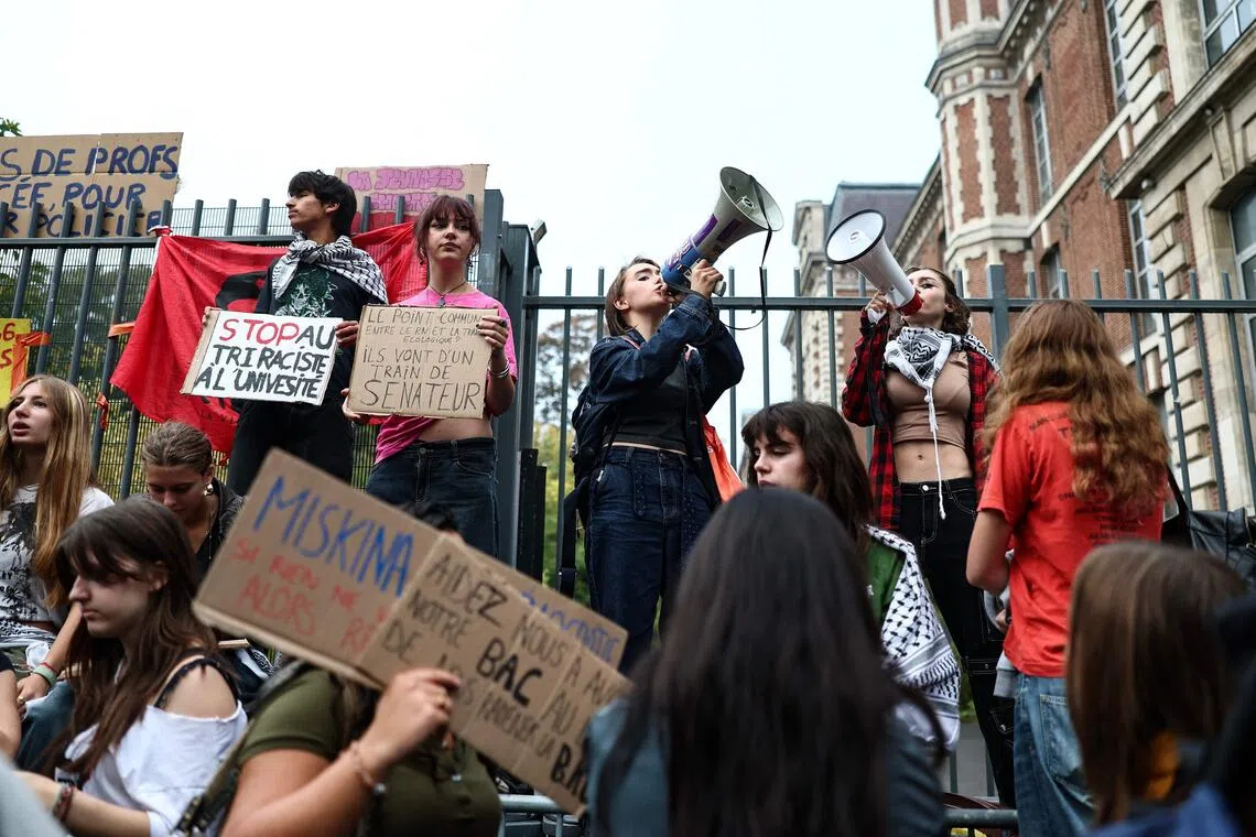 French teens blockade schools as unions vow day of ‘anger’ over cost-cutting budget
