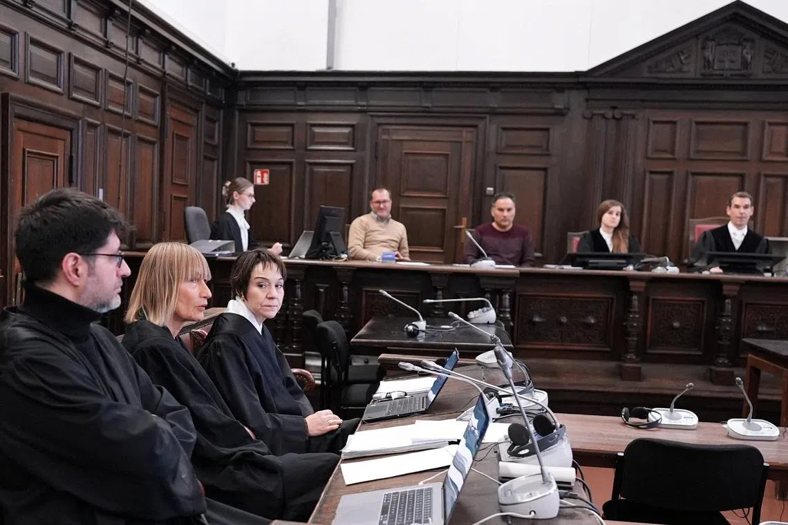 Lawyer Christiane Yueksel, defense lawyer of the accused and Christiane Berger, lawyer and defense lawyer for the accused wait in the courtroom before the start of the so called \"White Tiger\" trial in Hamburg, Germany, January 9, 2026. The trial against a 21-year-old man who allegedly used the online pseudonym \"White Tiger,“ is accused of forcing children and teenagers to self-harm and commit sexual acts online, leading to a 13-year-old boy taking his own life in the United States, began behind closed doors in Hamburg on Friday. The trial - which is being held in private due to the age and vulnerability of the victims - marks a precedent in Germany as the first time someone has gone on trial for murder in a suicide that occurred in a different jurisdiction.     Marcus Brandt/Pool via REUTERS