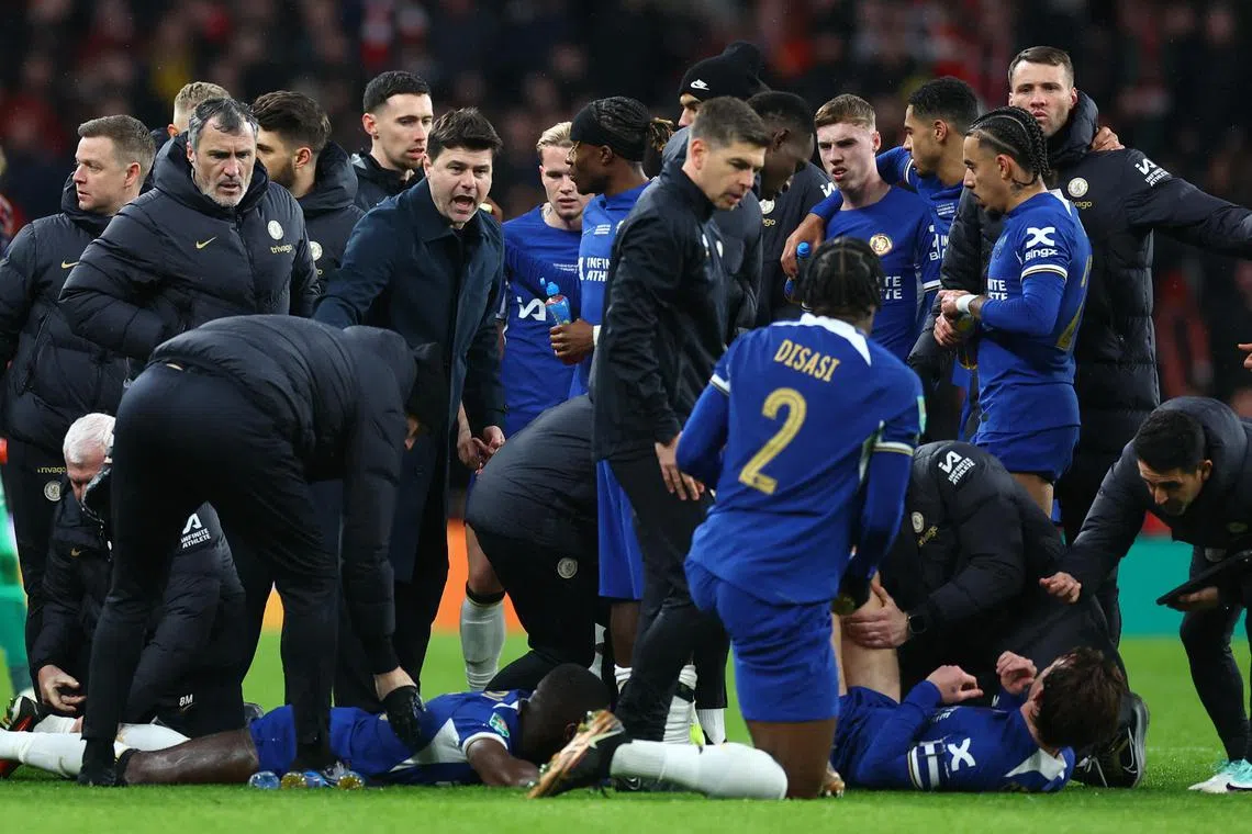 Chelsea manager Mauricio Pochettino rallying his players before extra time in the League Cup final against Liverpool. The Blues lost 1-0 in the end.