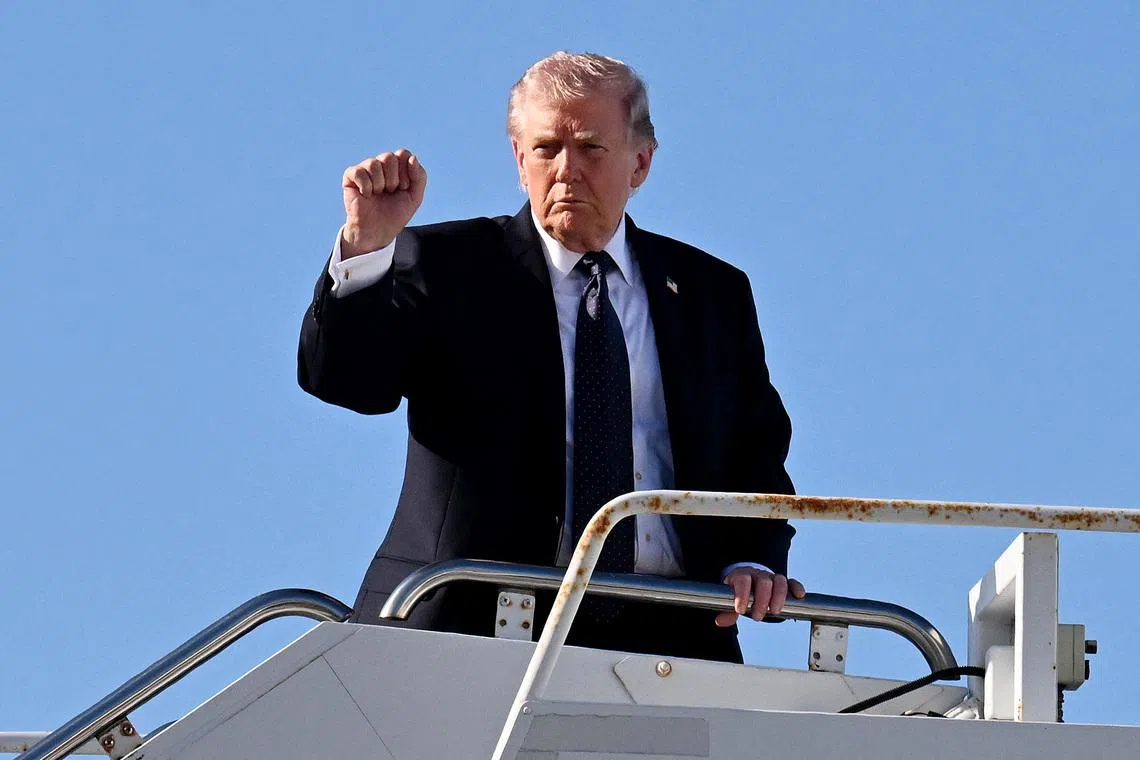 US President Donald Trump boards Air Force One at Palm Beach International Airport in Florida on March 1.