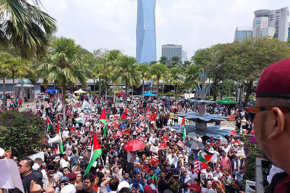 Thousands of Malaysians gathered at the National Mosque in Kuala Lumpur after Friday prayers on Oct 13, 2023.