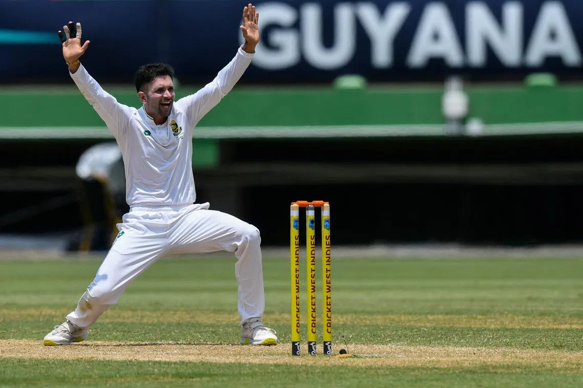 South Africa's Keshav Maharaj appealing for an lbw against Shamar Joseph of West Indies on day 2 of the 2nd cricket Test against West Indies at Guyana National Stadium in Providence on Aug 16, 2024.