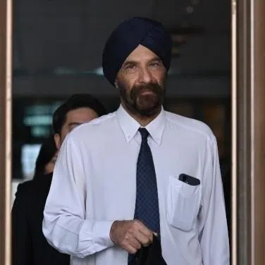 Senior Counsel Davinder Singh and Mr Low De Wei at the Supreme court on May 22.