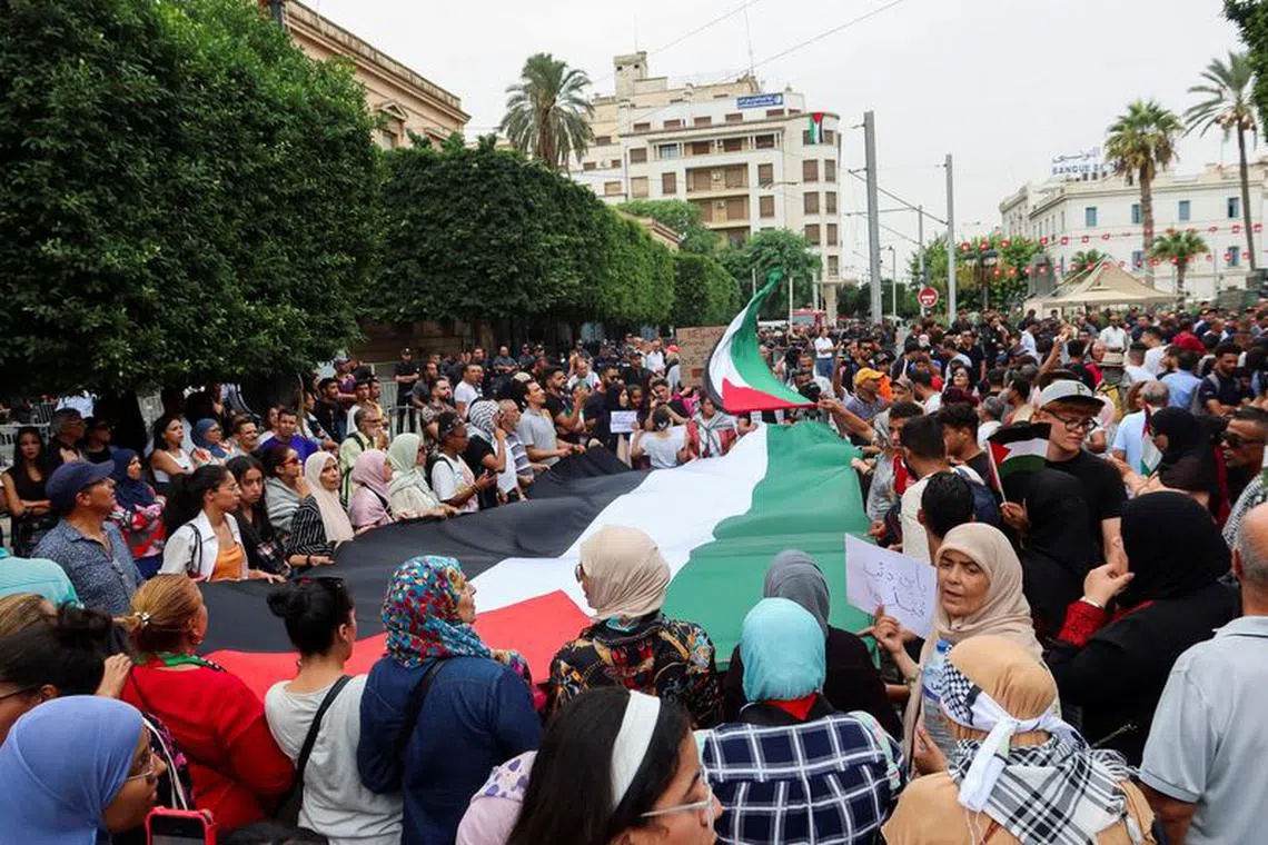 Tunisians gather during a pro-Palestinian protest to express solidarity with Palestinians in Gaza, in Tunis, Tunisia, October 20, 2023. REUTERS/Jihed Abidellaoui/File Photo