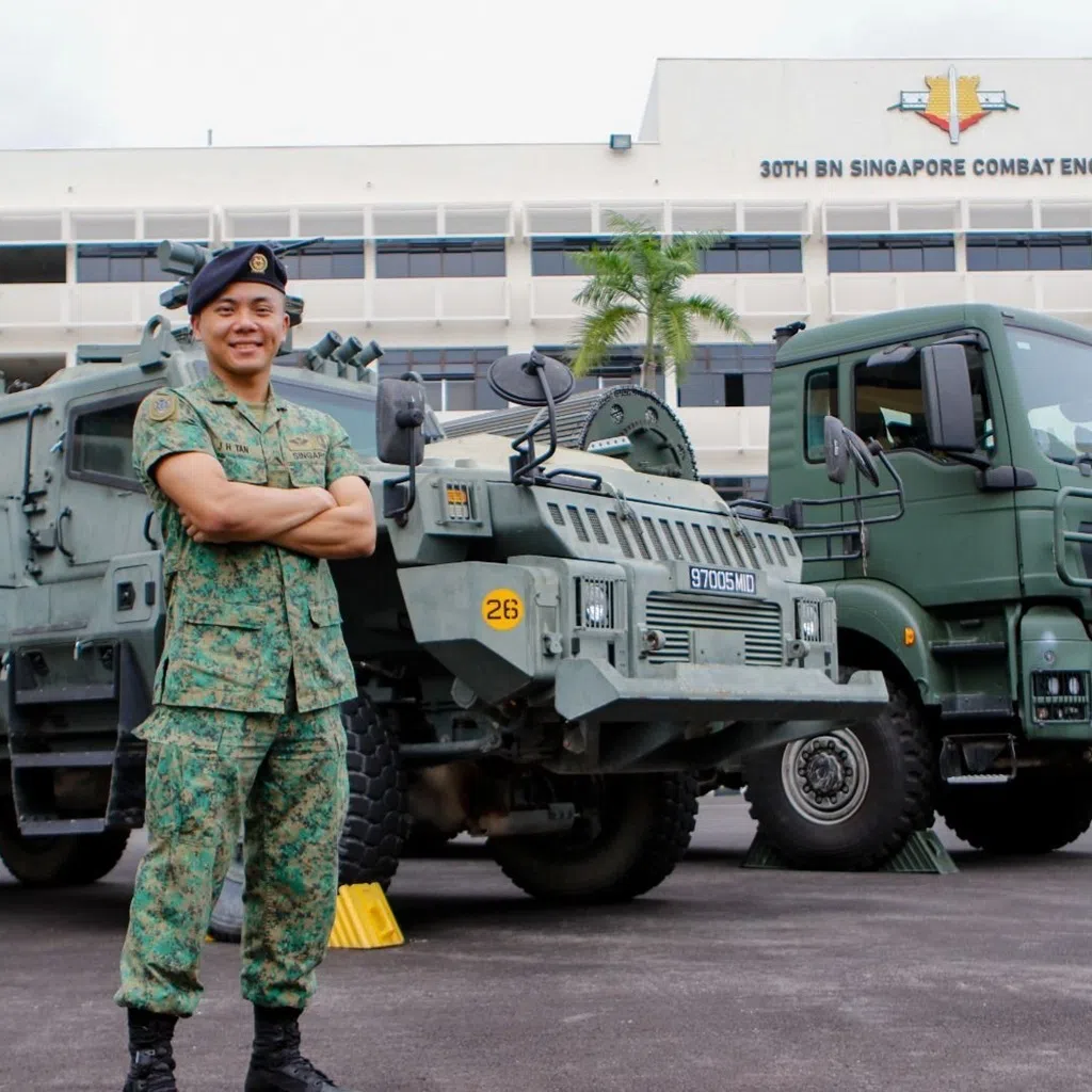 singapore army lieutenant-colonel brandon tan standing in front of military vehicles at 30th battalion, singapore combat engineers