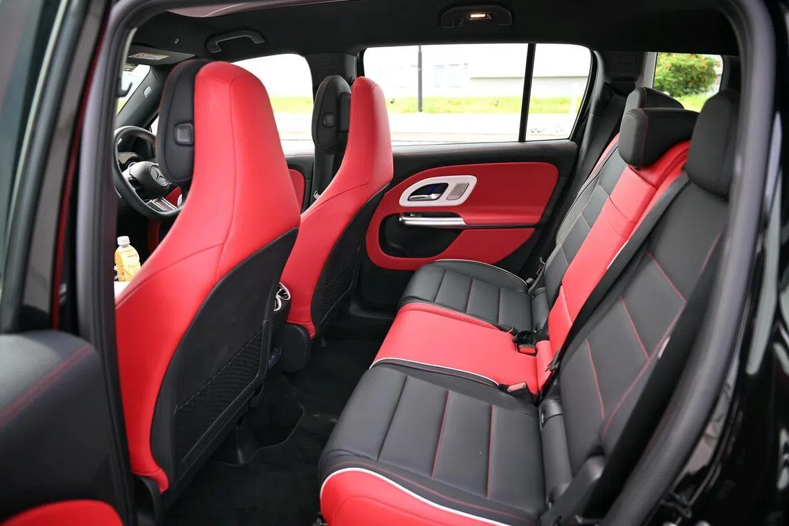 There is plenty of space for three in the middle row.