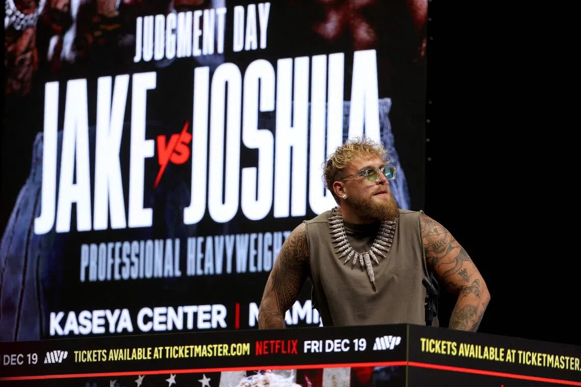 Jake Paul looks on during the press conference about his exhibition match against Anthony Joshua scheduled for December 19 at Kaseya Center.