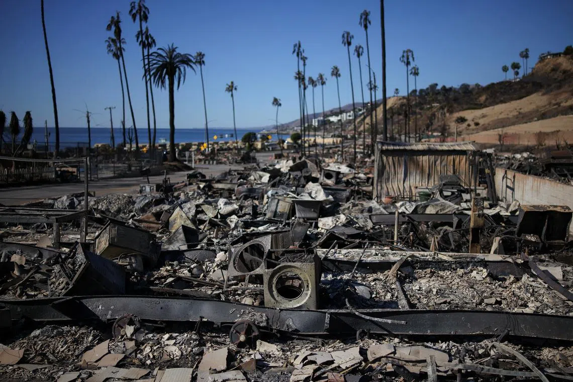 Burnt remains of a motorhome lie on the ground, after powerful winds fueling devastating wildfires in the Los Angeles area forced people to evacuate, in the Pacific Palisades neighborhood on the west side of Los Angeles, California, U.S. January 13, 2025. REUTERS/Daniel Cole