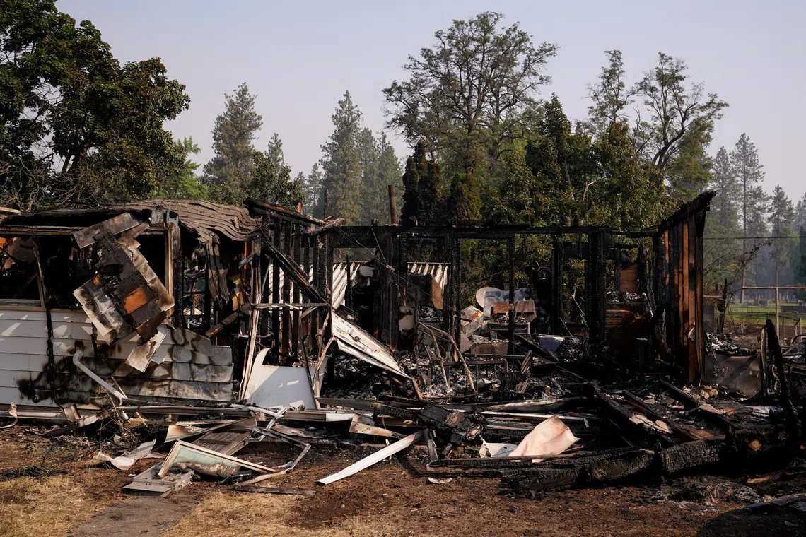 Wildfires near Spokane, Washington, destroy more than 700 buildings and force 64,000 to flee