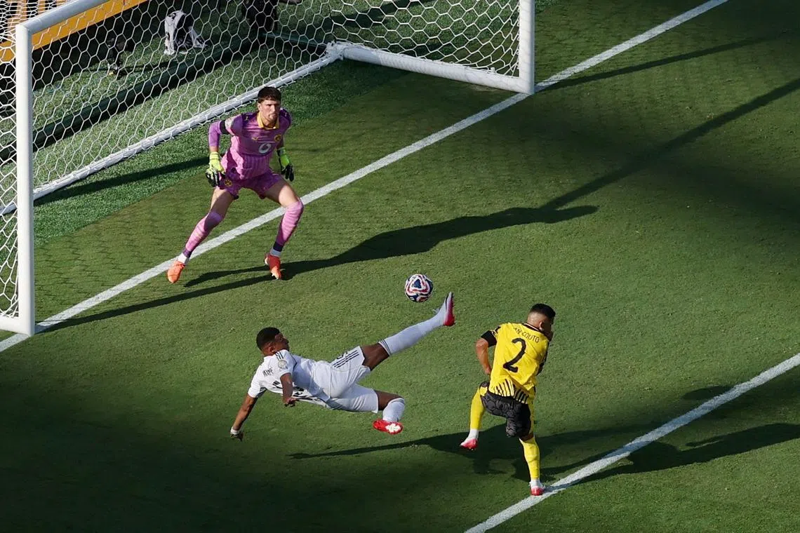 Real Madrid's Kylian Mbappe scoring the third goal in their 3-2 Club World Cup semi-final win against Borussia Dortmund on July 5.