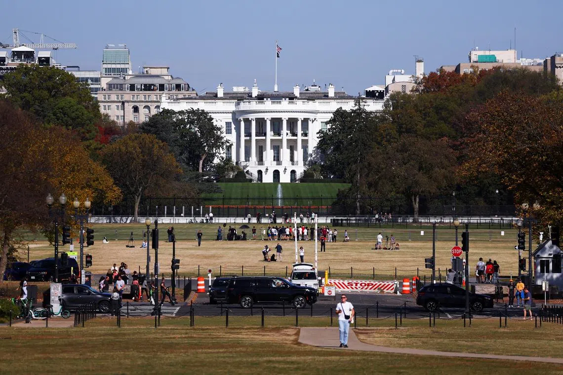 People gather outside the White House, after Republican Donald Trump won the U.S. presidential election, in Washington, D.C., U.S., November 6, 2024. REUTERS/Hannah McKay