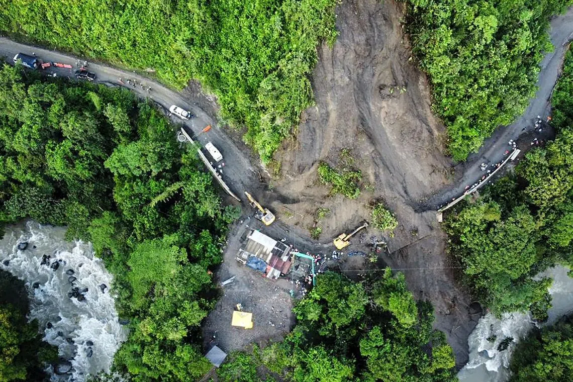 The landslide hit the vehicle between the villages of Pueblo Rico and Santa Cecilia in Risaralda province.