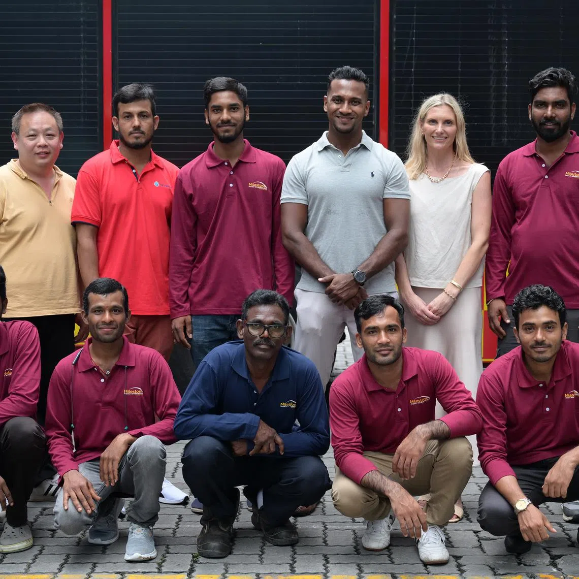 Recipients of SCDF’s Community Lifesaver award (back row, from left) Ramesh Kumar, Benson Lo, Shakil Mohammad, Hasan Emamul, Shaik Amirudin, Laura Biffin, Chinnappa Kannadasan and Govindaraj Elangeshwaran and (front row, from left) Muthukumar Mugesh, Ravi Kumar, Varuvel Christopher, Das Taposh and Hasan Rajib.