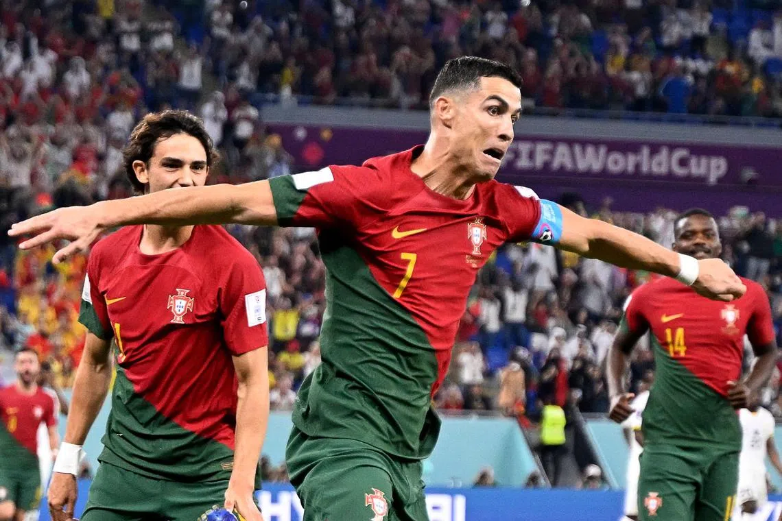 Ronaldo celebrates scoring his penalty for Portugal, in a 3-2 win over Ghana.