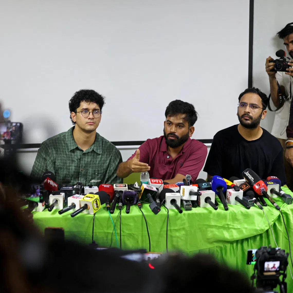 Abhijeet Dipke, head of the Cockroach Janta Party (CJP) speaks as the party's convenors Ashutosh Ranka and Saurav Das look on during a press conference to demand resignation of India's Chief Election Commissioner Gyanesh Kumar, in New Delhi, India, September 24, 2026. REUTERS/Bhawika Chhabra