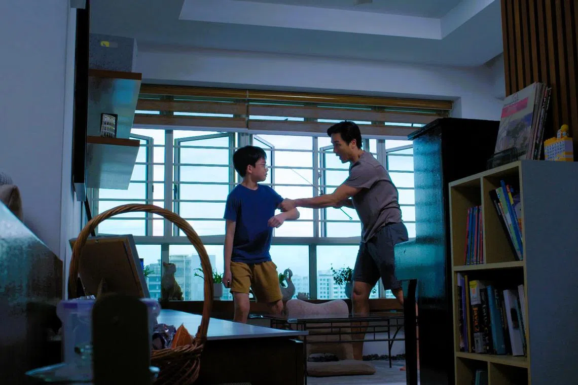 Liu Yige (played by Andie Chen) disciplining his son Liu Yuanyang (Lincoln Ang) in a scene from Channel 8 drama Born To Shine.