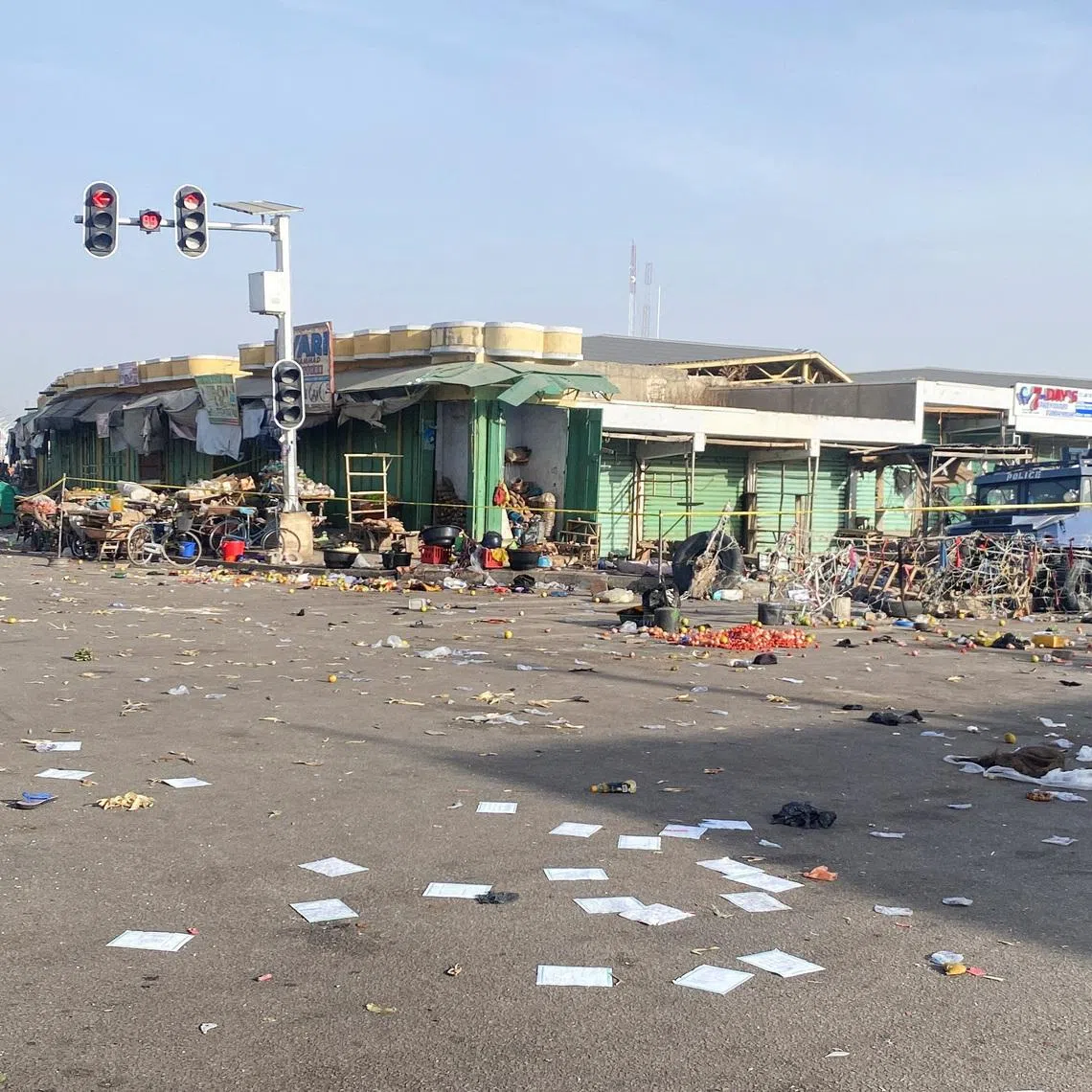 A Nigerian police truck stands at the deserted Maiduguri Monday Market, the morning after multiple explosions struck the northeastern city of Maiduguri, Borno State, Nigeria, March 17, 2026. REUTERS/Ahmed Kingimi