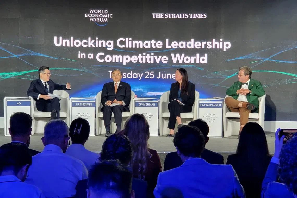 (From left) ST editor Jaime Ho moderating a panel discussion with Mr Liu Zhenmin, Beijing’s Special Envoy for Climate Change, Professor Julie Zimmerman, Vice-Provost, Planetary Solutions, at Yale University and Professor Kim Sang-Hyup, co-chairperson of South Korea’s Presidential Commission on Carbon Neutrality and Green Growth.