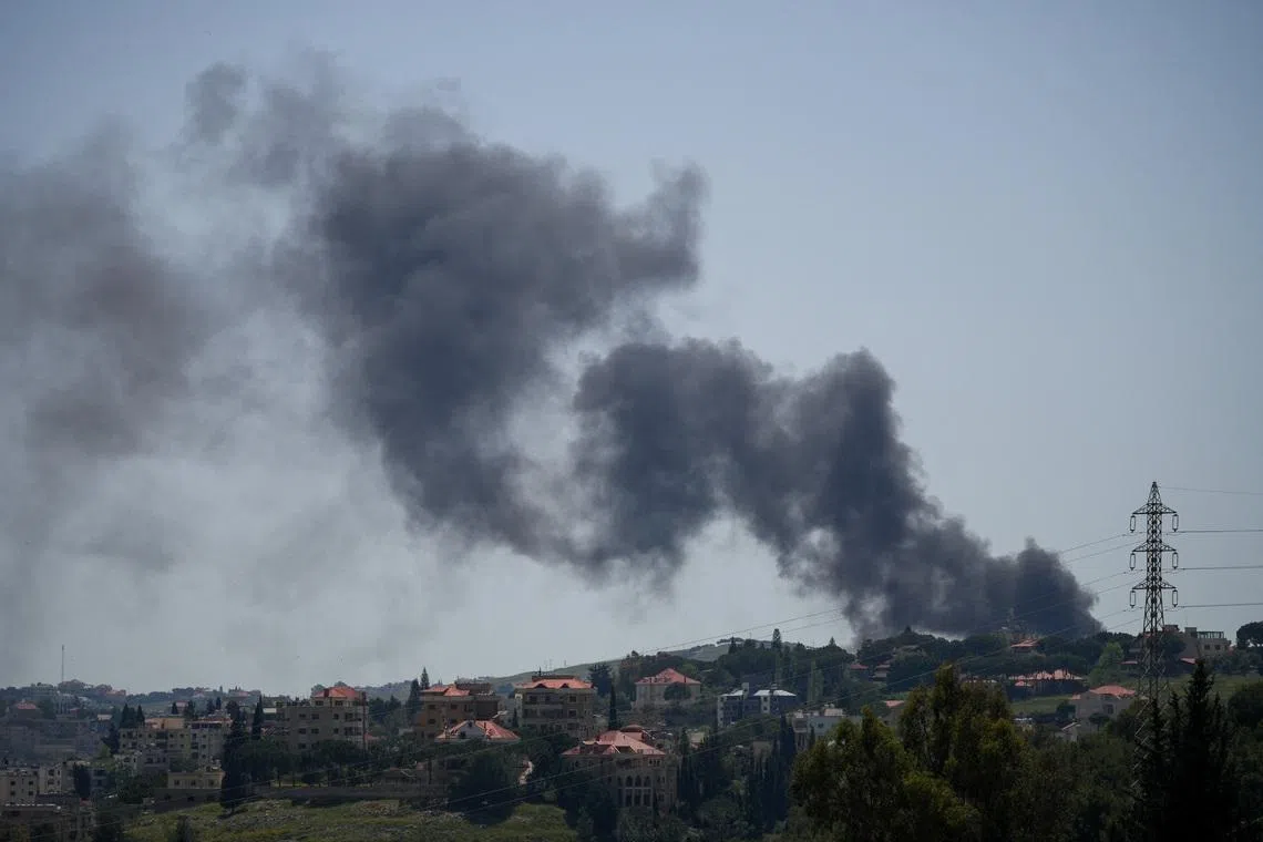 Smoke rises following an Israeli strike in Kfar Tebnit, Lebanon, May 11, 2026. REUTERS/Stringer