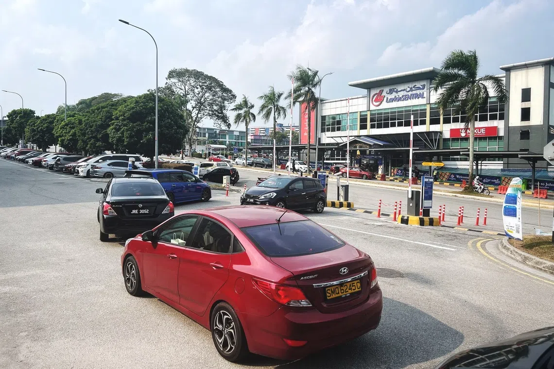 JB commercial areas are short of parking due to Singapore workers. Can a new paid system solve this?