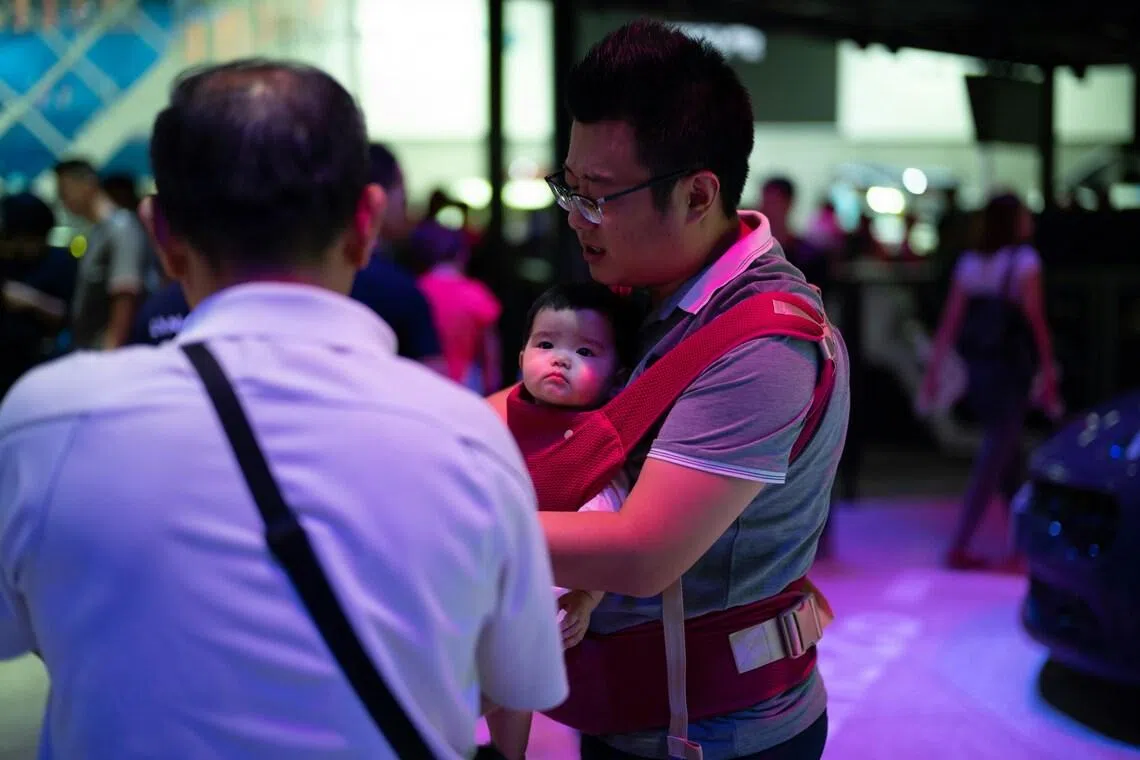 High-powered dads are spending less time at work, more on childcare