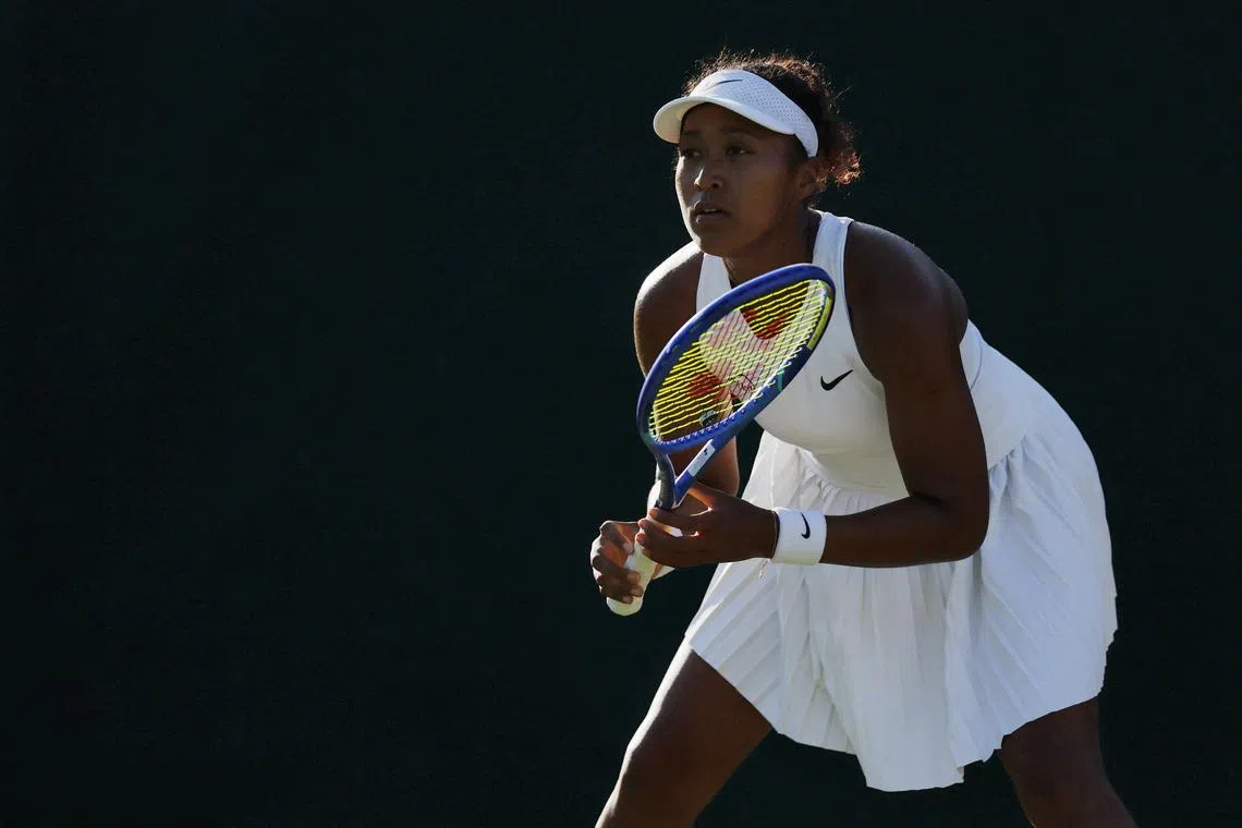 Tennis - Wimbledon - All England Lawn Tennis and Croquet Club, London, Britain - July 2, 2025 Japan's Naomi Osaka during her second round match against Czech Republic's Katerina Siniakova REUTERS/Stephanie Lecocq