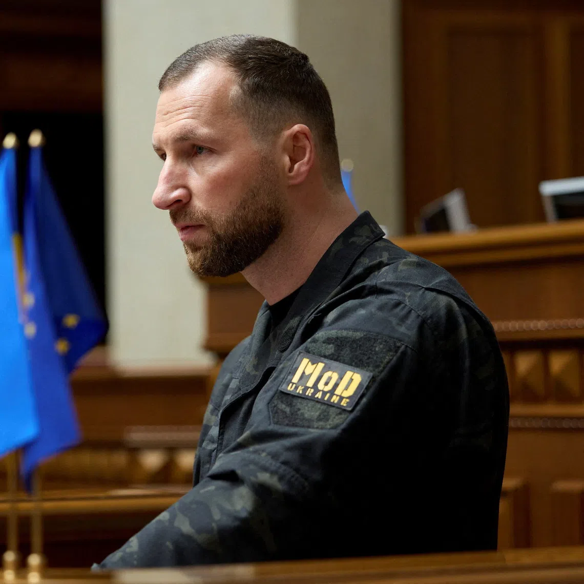 Newly appointed Ukrainian Defence Minister Yevhenii Khmara attends a session of the Ukrainian Parliament on Aug 19 in Kyiv.
