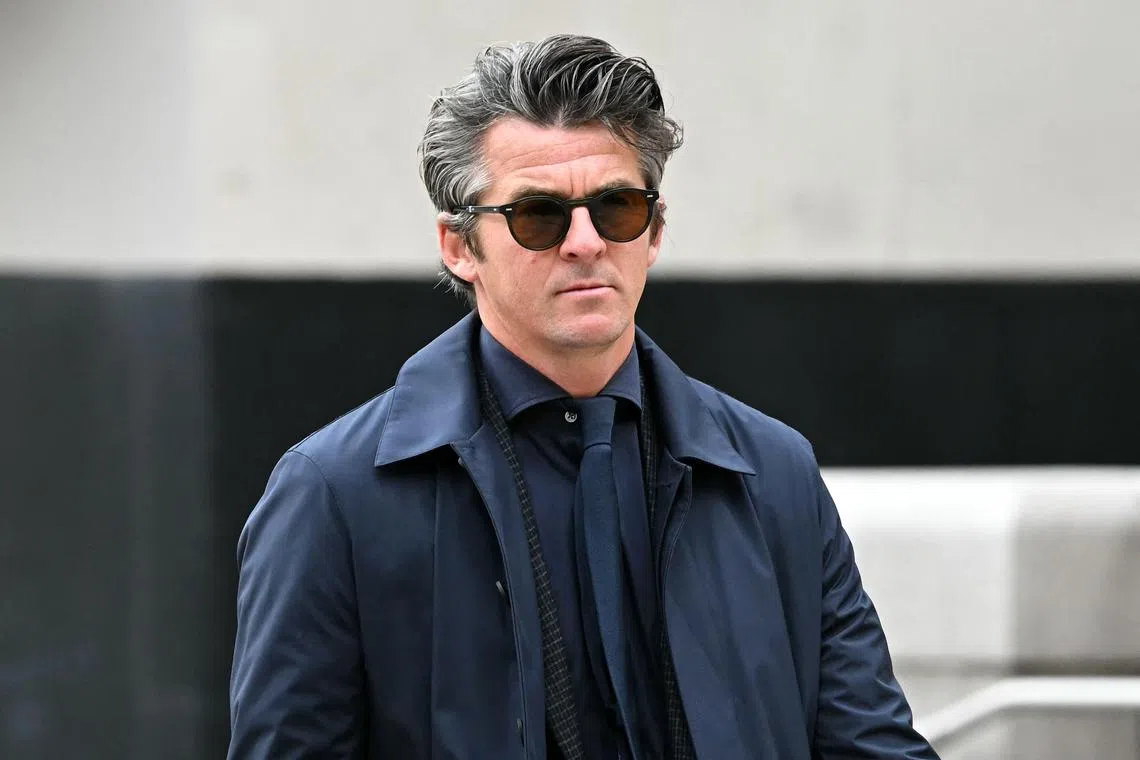 Former footballer Joey Barton grabbed his wife and pushed her to the ground before kicking her in the head after a drunken row about a family matter.