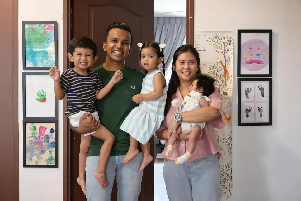 thrace/ST20240726_202470000284/Ng Sor Luan/
Mr Balaji Prem Chand, 35, is carrying  Kiaan, 4 (left) and Jaanya, 2. His wife Dawn Lim, 33, is carrying  Ishaan, one-month-old.

