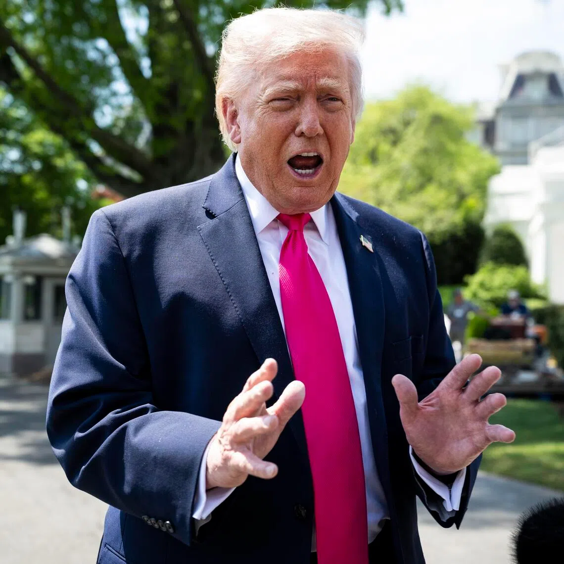 US President Donald Trump speaking to members of the media on the South Lawn of the White House on April 16.