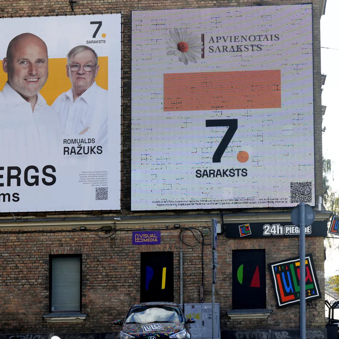 \"Unites List\" election campaign poster featuring Prime Minister Andris Kulbergs before the general election in Riga, Latvia, September 27, 2026. Sign reads \"Kulbergs is the solution\". REUTERS/Ints Kalnins