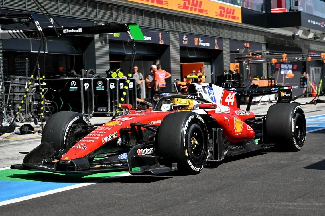 Formula One F1 - Hungarian Grand Prix - Hungaroring, Budapest, Hungary - July 26, 2026 Ferrari's Lewis Hamilton in the pit lane during the race Pool via REUTERS/Andrej Isakovic