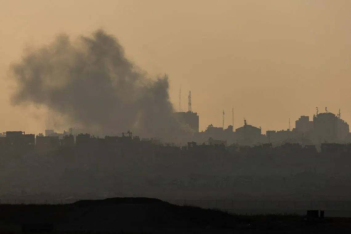 Smoke rises from Gaza, amid the Israel-Hamas conflict, near the Israel-Gaza border, as seen from Israel, July 8, 2024. REUTERS/Amir Cohen