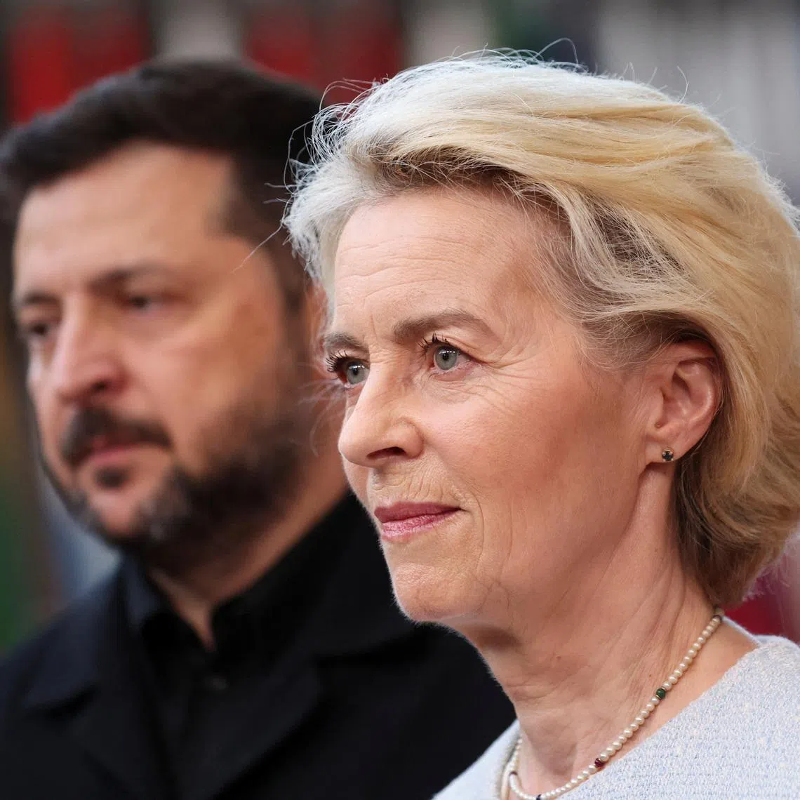 Ukrainian President Volodymyr Zelensky (left) and EU President Ursula von der Leyen meet with the media on the day of a European Union leaders' summit in Brussels on June 18.