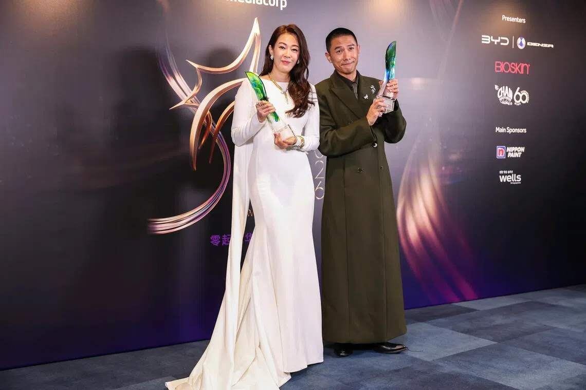 Best Actress Jesseca Liu and Best Actor Desmond Tan posing with their awards at the Star Awards at Mediacorp on April 19, 2026.