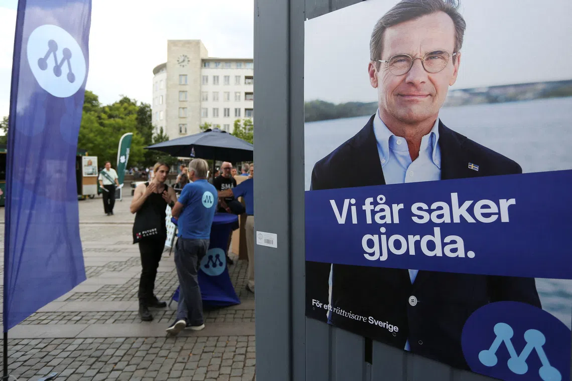 A poster of Swedish Prime Minister and leader of the Moderates Ulf Kristersson on his party’s campaign stand for the upcoming election in Malmo, Sweden, August 26, 2026. REUTERS/Tom Little