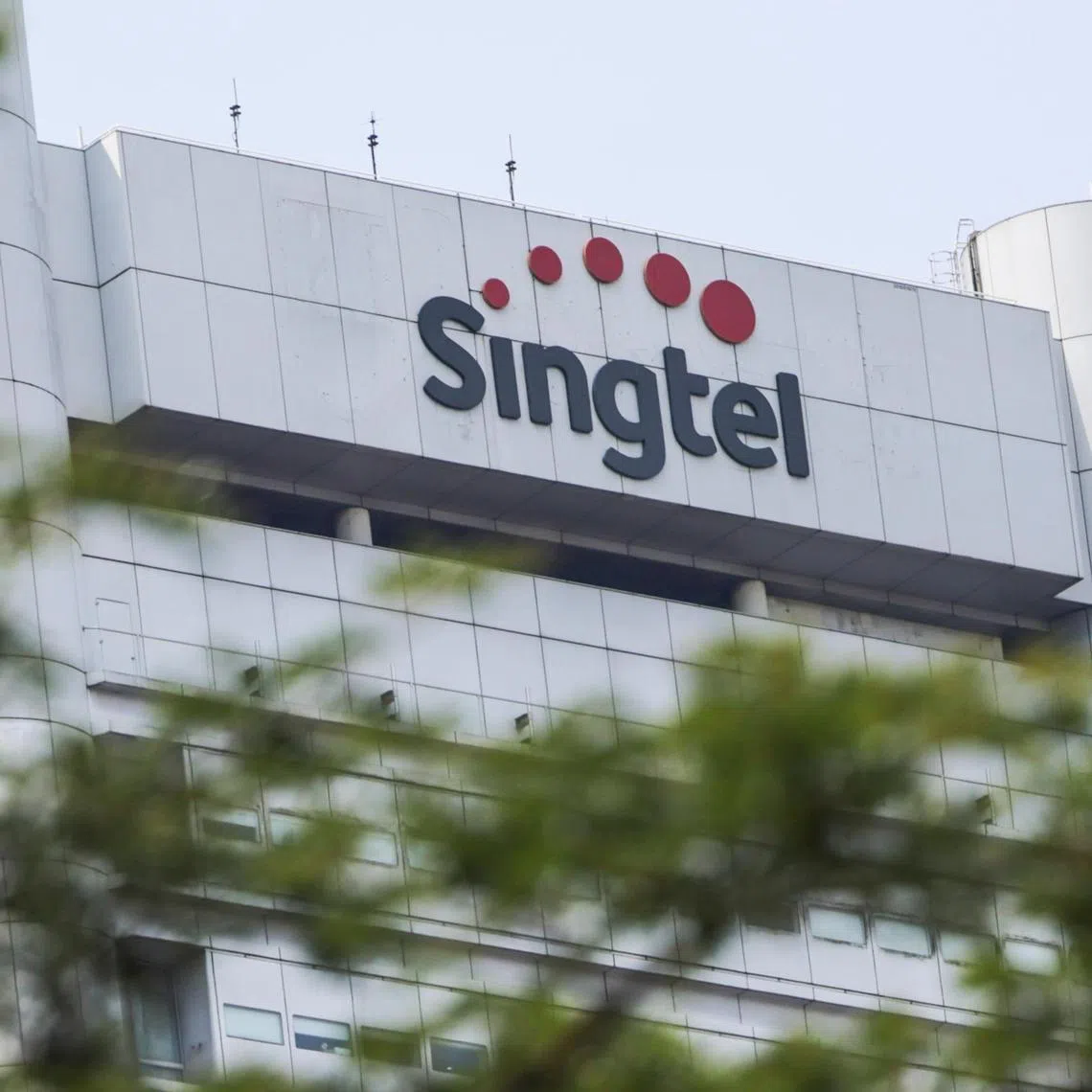 Singtel's first-half net profit was down 42 per cent to $1.23 billion, hurt by the absence of a  $1.2 billion one-off gain a year-ago.