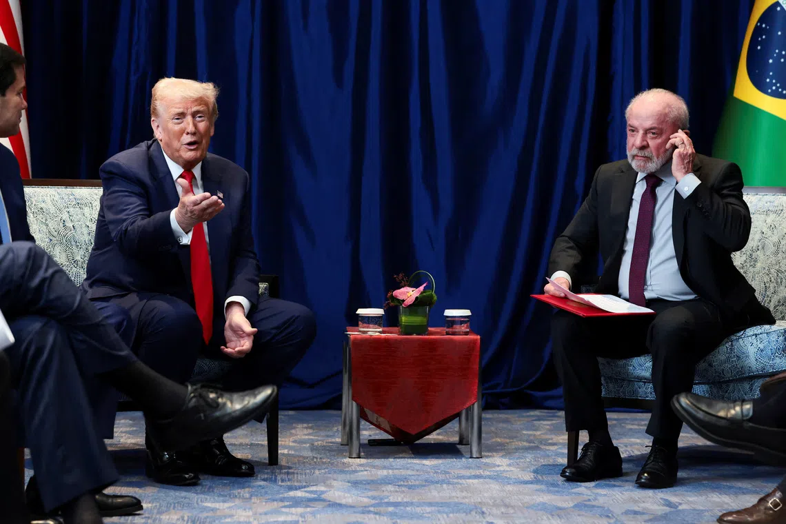 US President Donald Trump (left) meeting Brazilian President Luiz Inacio Lula da Silva on the sidelines of the Asean summit in Kuala Lumpur on Oct 26.