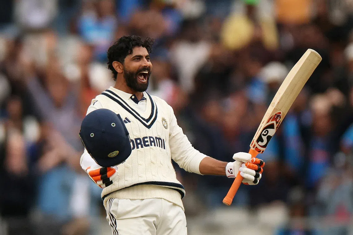 Cricket - International Test Match Series - Fourth Test - England v India - Old Trafford Cricket Ground, Manchester, Britain - July 27, 2025 India's Ravindra Jadeja celebrates after reaching his century Action Images via Reuters/Lee Smith