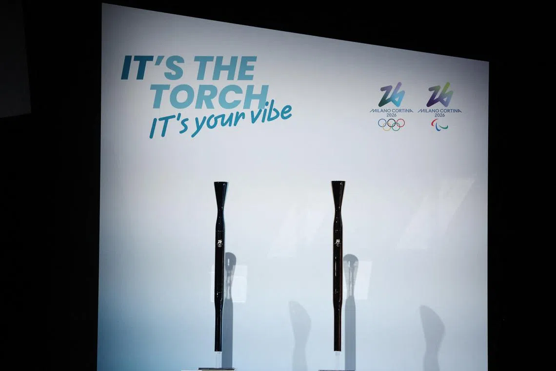 FILE PHOTO: 2026 Milano Cortina Winter Olympics - News conference to present Olympic and Paralympic torches - Milan, Italy - April 14, 2025 The 2026 Milano Cortina Winter Olympics and Paralympic torches are displayed during a ceremony REUTERS/Claudia Greco/File Photo