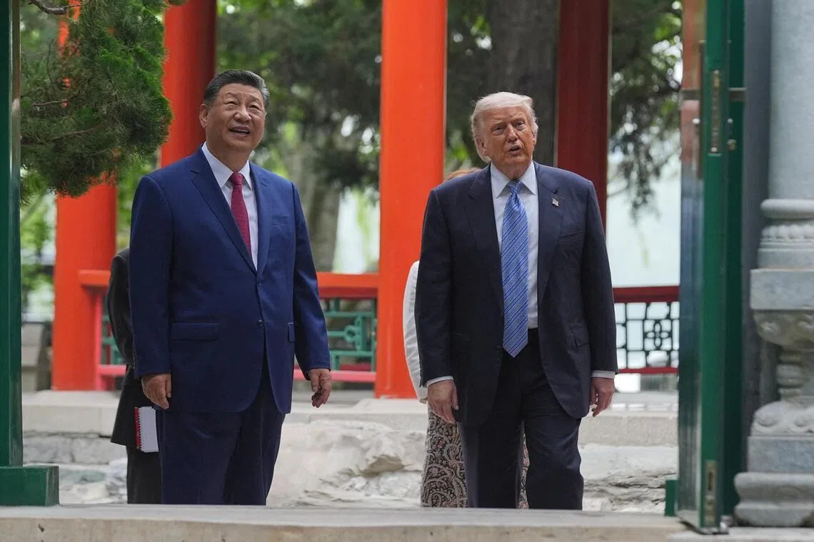 US President Donald Trump (right) said he discussed lifting sanctions on Chinese companies that buy Iranian oil.