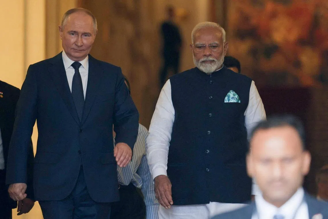 Russia's President Vladimir Putin and India's Prime Minister Narendra Modi at the Kremlin in Moscow on July 9.