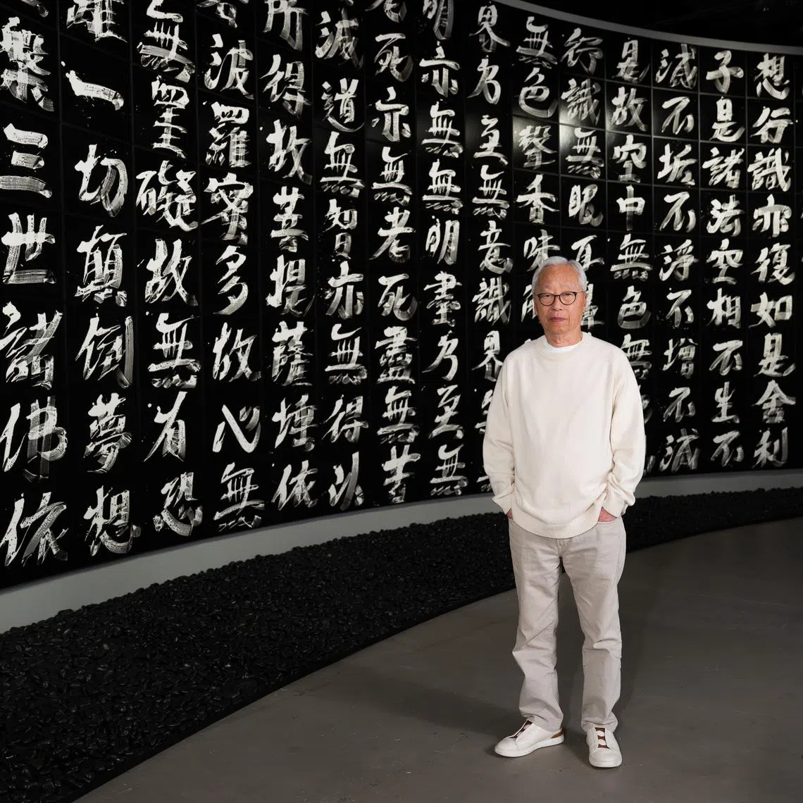 Hiroshi Sugimoto with his work Brush Impression, Heart Sutra (2023) 