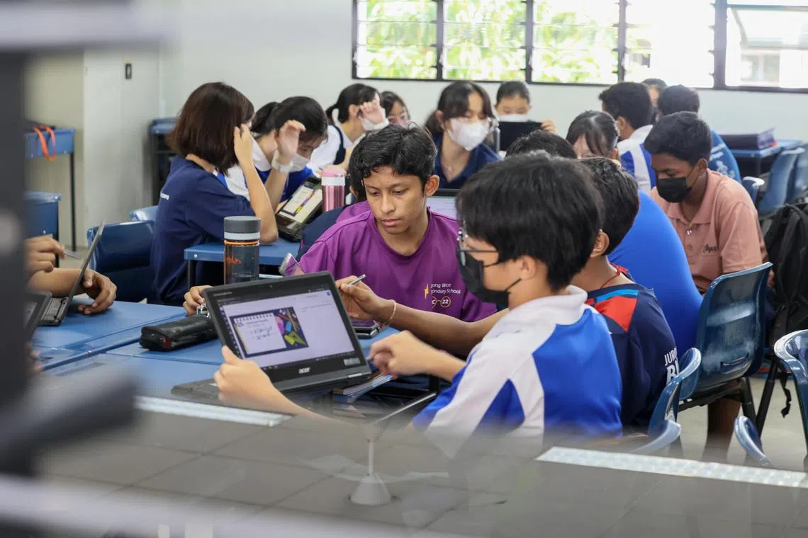 Jurong West Secondary School implementing Full Subject-Based Banding. The students wear different coloured form class t-shirts depicting how students from different mixed form classes come together to take subject-level classes.