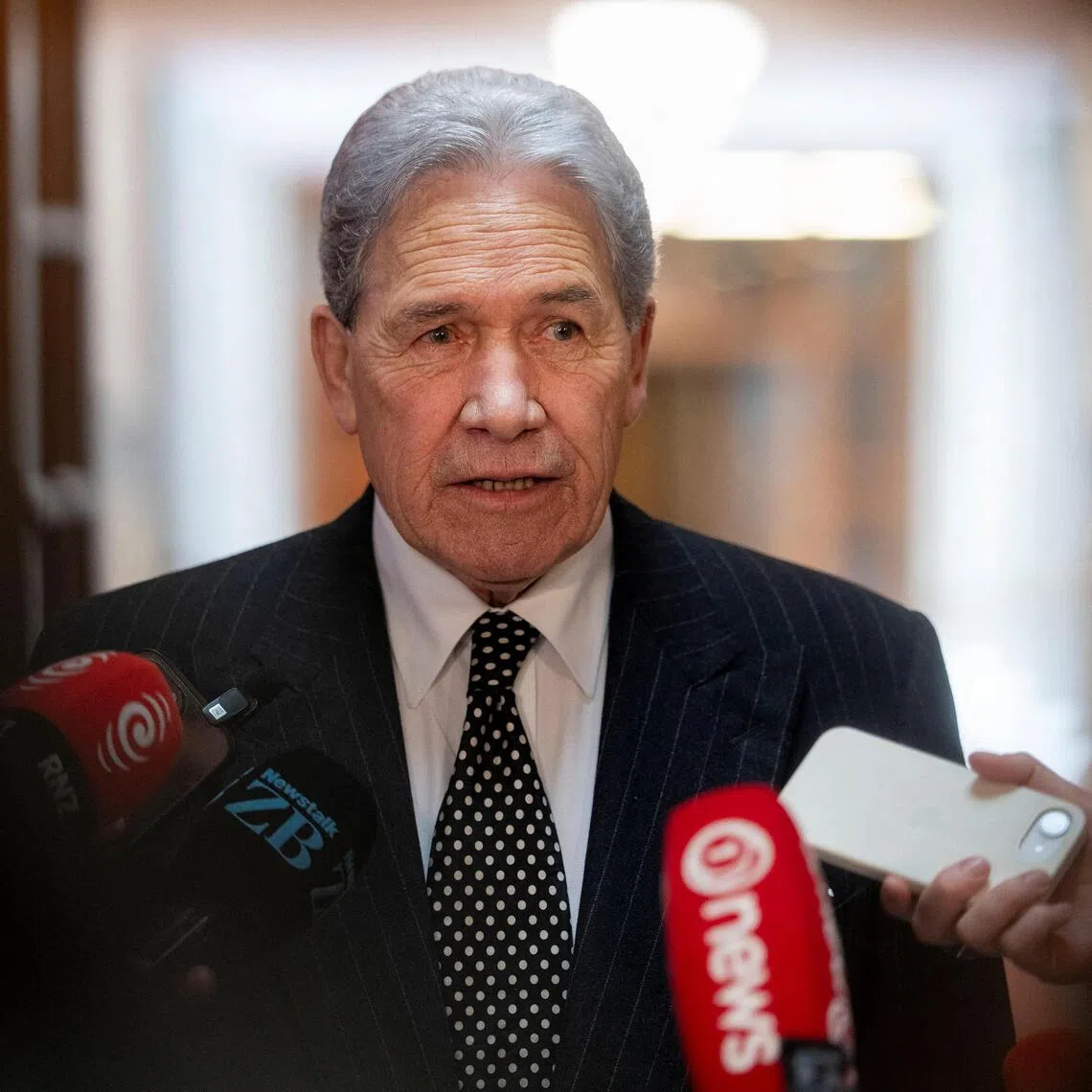 Leader Winston Peters, who is of Maori descent and has long opposed policies that he says give Maori preferential treatment.