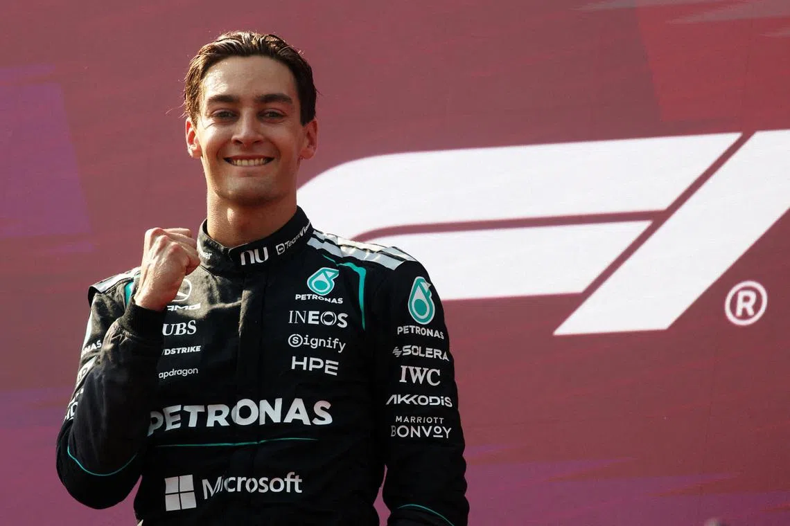 Formula One F1 - Austrian Grand Prix - Red Bull Ring, Spielberg, Austria - June 28, 2026 Mercedes' George Russell celebrates on the podium after winning the Austrian Grand Prix REUTERS/Leonhard Foeger
