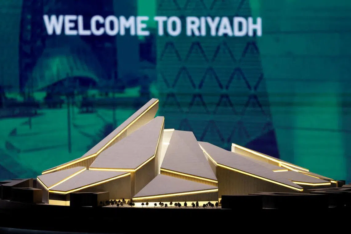 FILE PHOTO: Soccer Football - FIFA expected to confirm Saudi Arabia as 2034 World Cup hosts - Riyadh, Saudi Arabia - December 11, 2024 A model of the proposed Roshn Stadium is seen inside the Saudi Arabia World Cup bid exhibition REUTERS/Hamad I Mohammed/File Photo