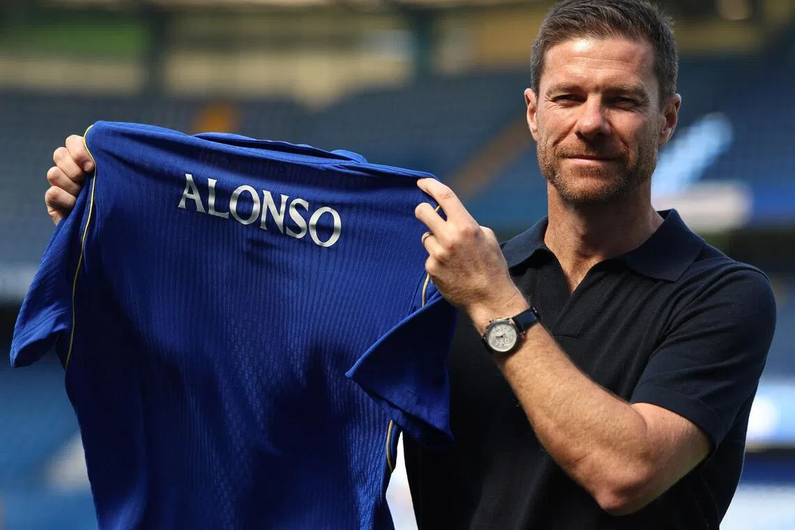 Xabi Alonso, manager of Chelsea Football Club, posing with a jersey after a press conference at Stamford Bridge in London, Britain, 13 July 2026.  EPA/NEIL HALL